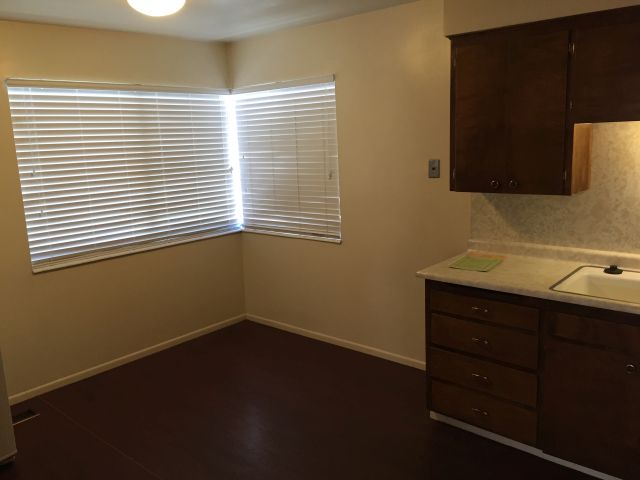 Dining area is bright with large corner windows