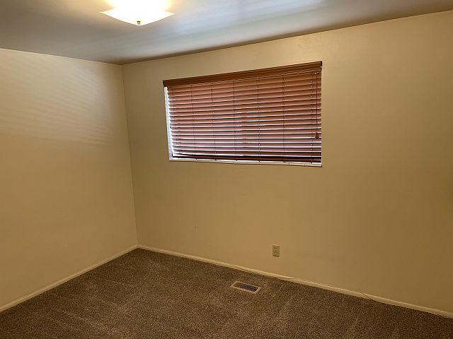Bedroom with large window