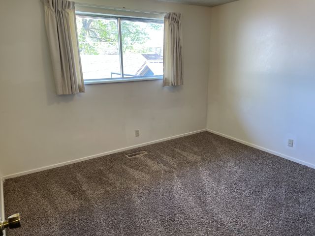 Second bedroom has a large closet & window