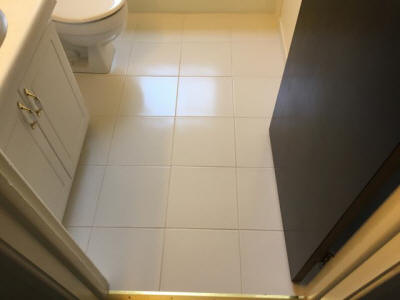 NEW ceramic tile on bath floor