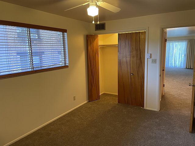 Bedroom has large lighted closet