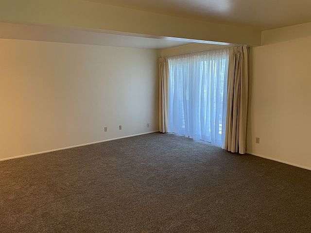 Living room & patio door to deck