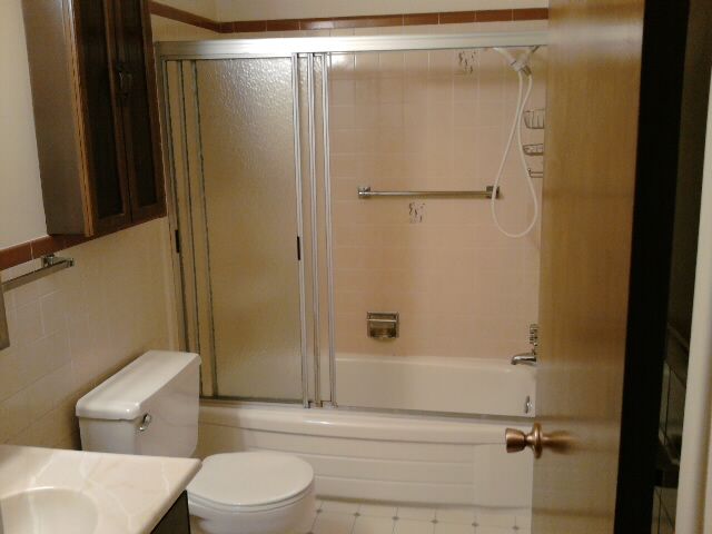 Medallion Apt. #2 Full Bath - heat lamps, vent fan shower wand & tub doors