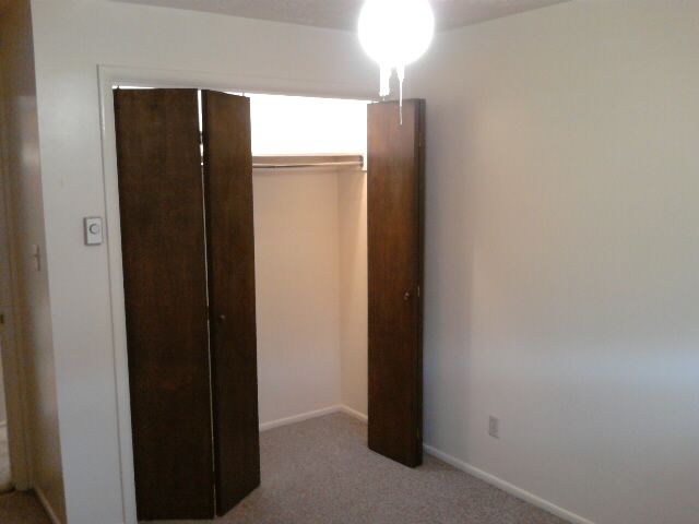 Second bedroom has large lighted closet & ceiling fan